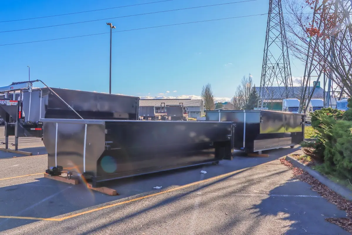 Roll-off dumpster ready for waste disposal at job site for 20 Yard Dumpster Rental in St. John
